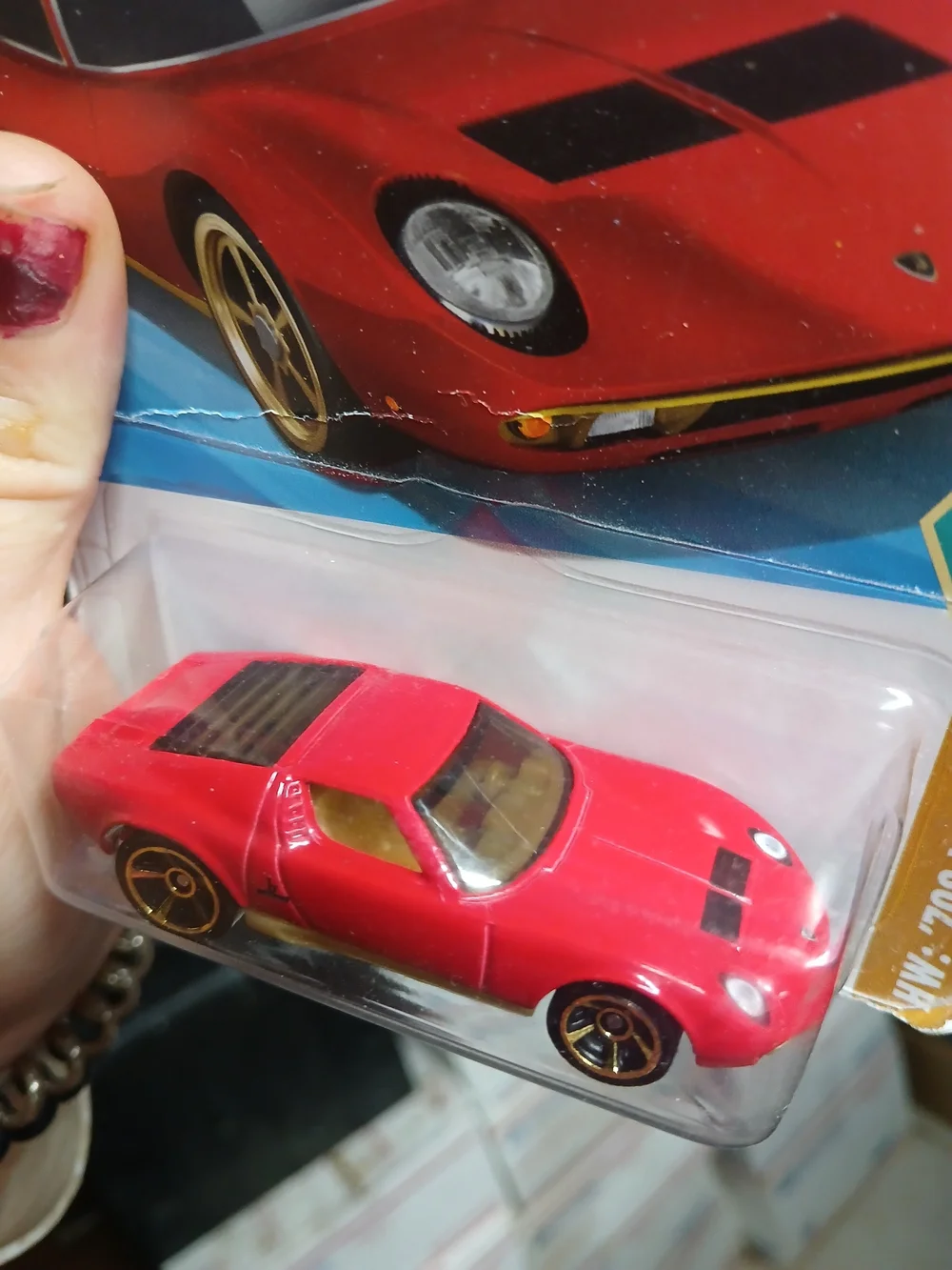 1:64 scale red Hot Wheels '71 Lamborghini Miura SV from the 2025 HW: '70s vs. '9